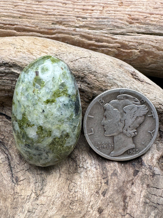 Green feldspar cabochon ￼